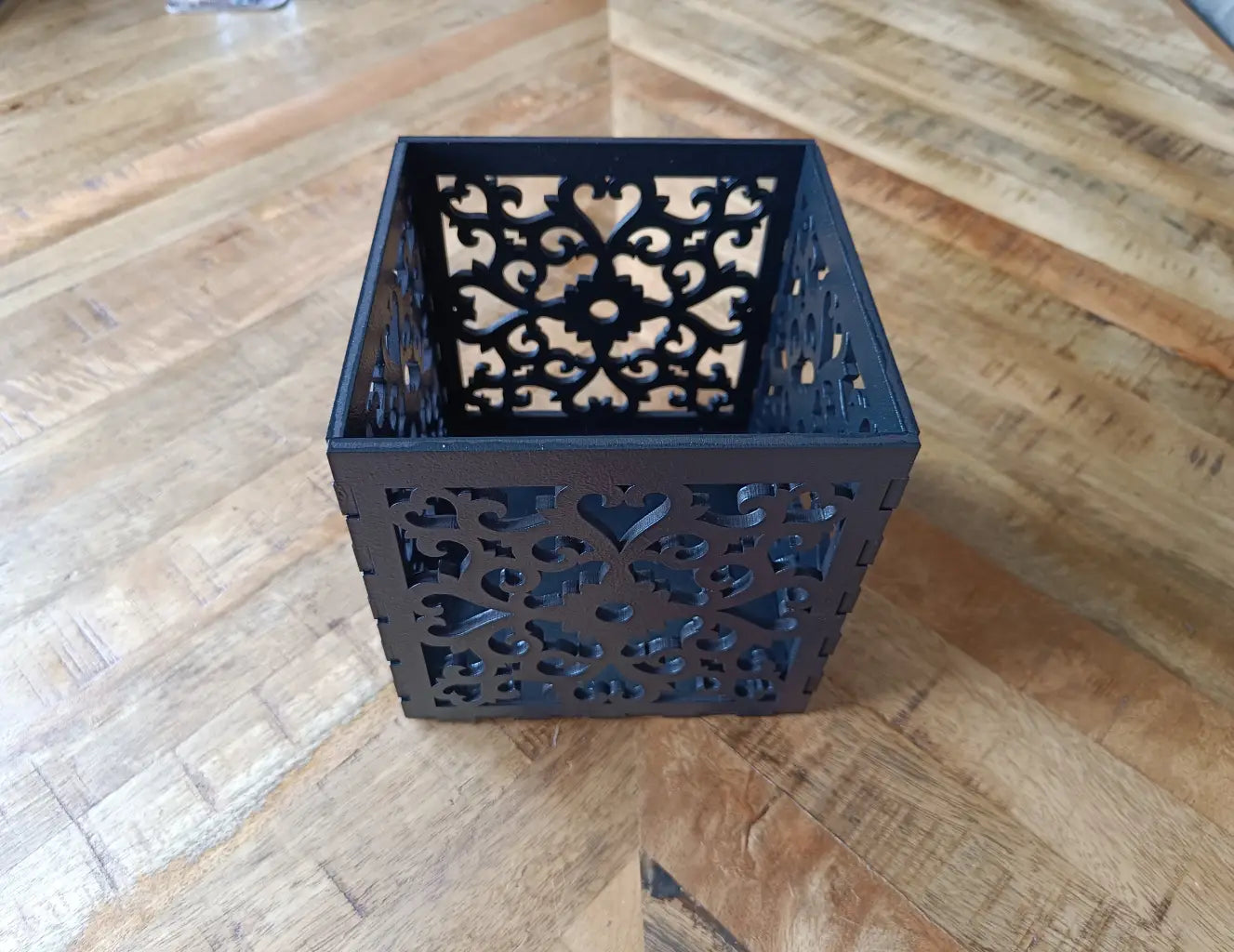 Houten zwarte kaarsenhouder