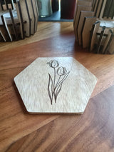 Houten onderzetters met bloemen