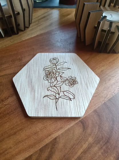 Houten onderzetters met bloemen