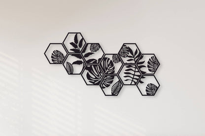 Houten wanddecoratie van bladeren in 11 hexagons