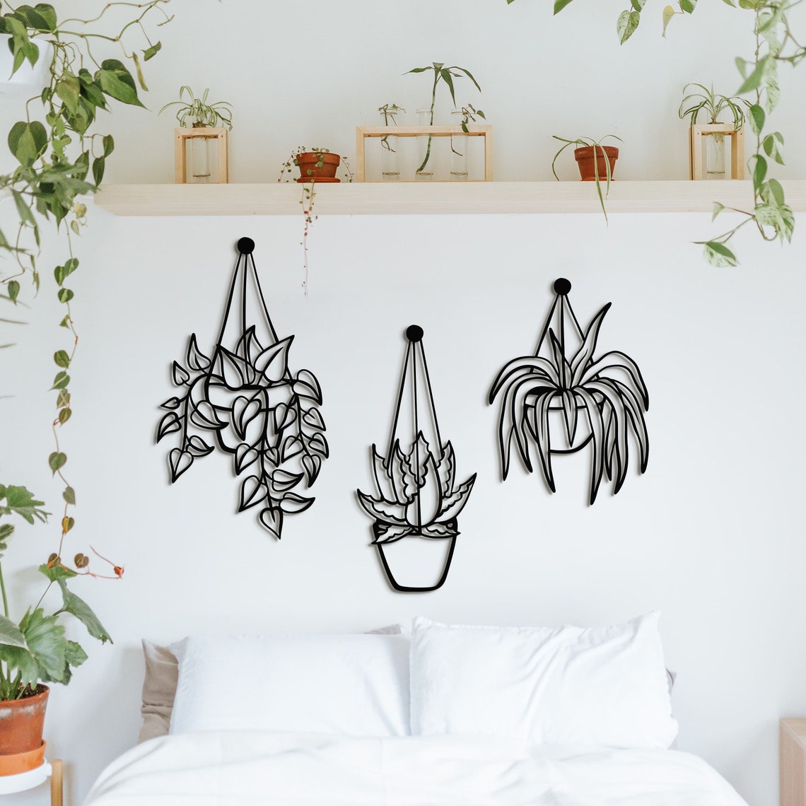 Houten wanddecoratie van vetplanten in de vorm van een drie luik